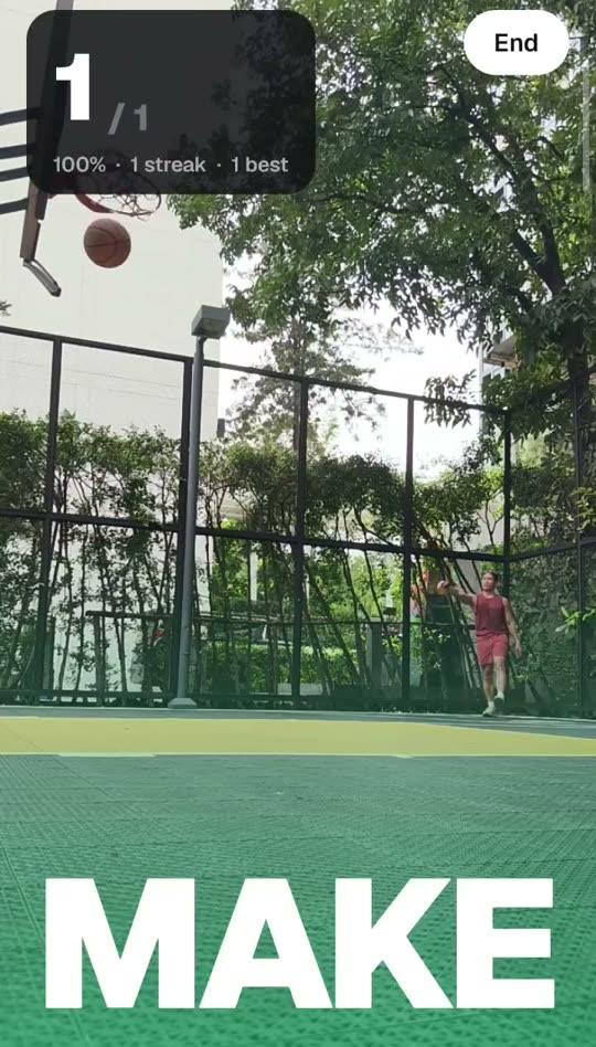 GetBuckets mid-session: the hoop framed by the phone camera with the running count on screen.